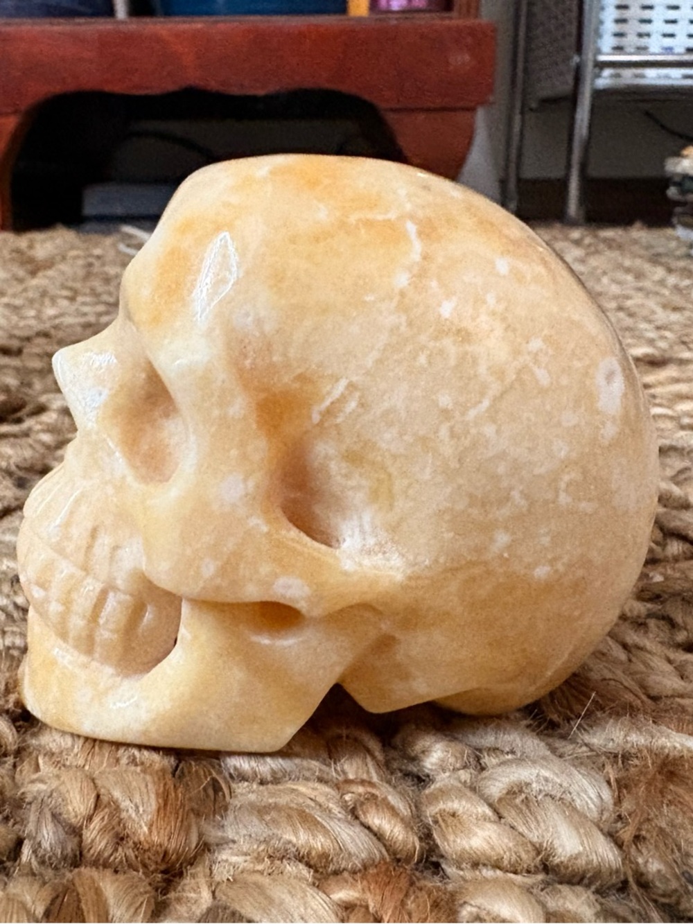 Hand-Carved Yellow Marble Skull Sculpture